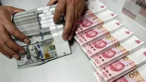 اليوان الصيني مقابل الدولار 2025:...